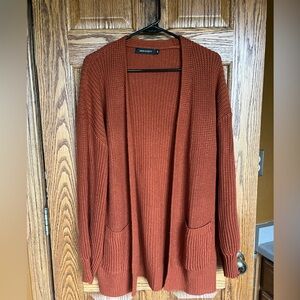 Rust orange cardigan sweater